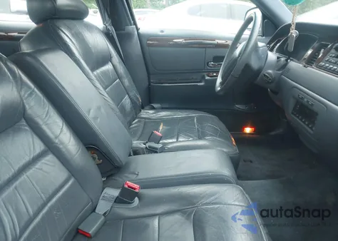 1999 Lincoln Town Car Executive из США, поврежденный, VIN 1LNHM81W0XY718096